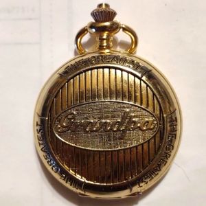 Gold vintage wranglers pocket watch that says Grandpa